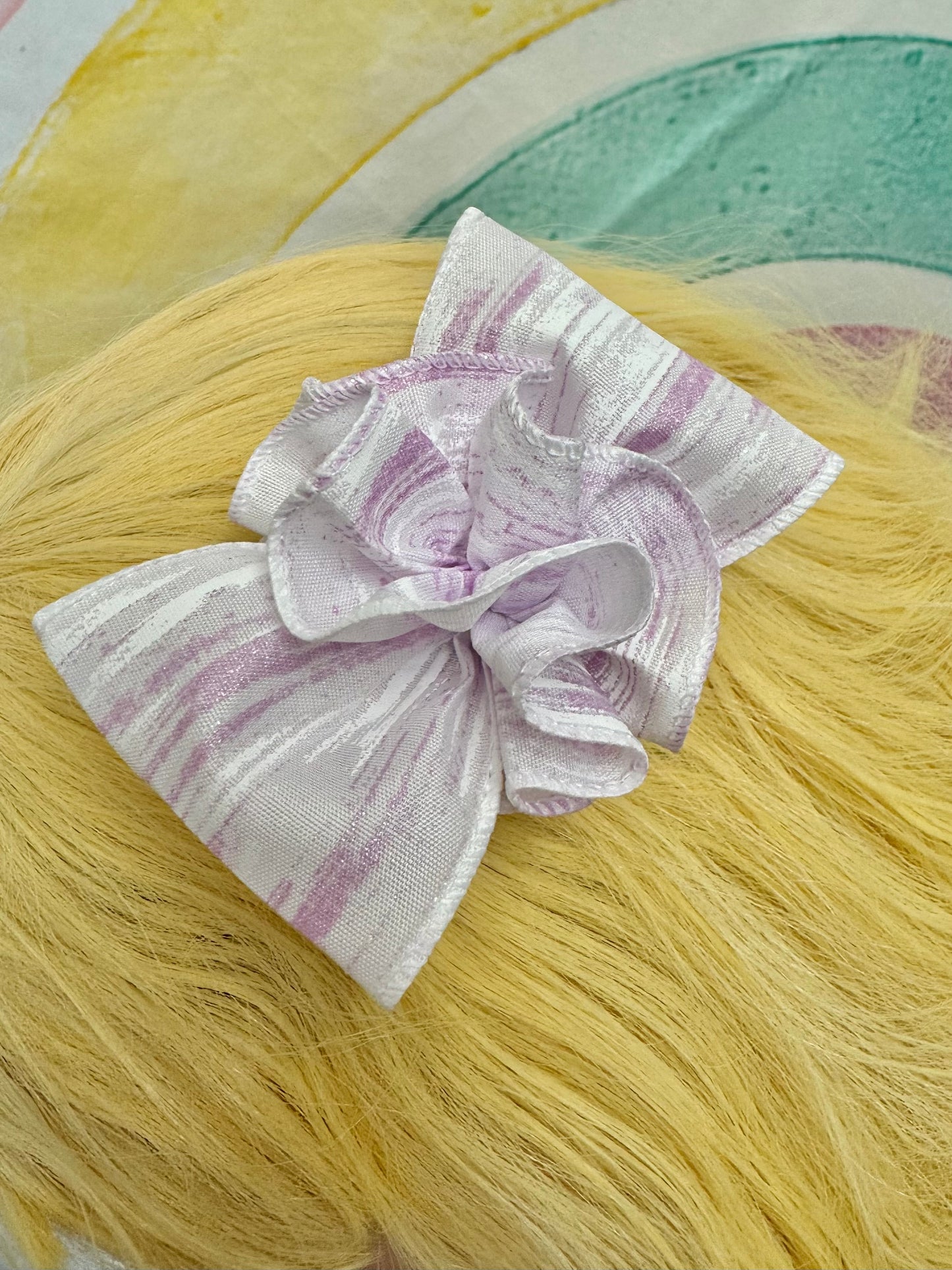 3.5” Purple Swirl Bow with Ruffle Ball